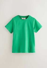 T-shirt en coton vert à manches courtes, décolleté rond et logo discret au niveau de l'ourlet. Texture lisse et design uni.