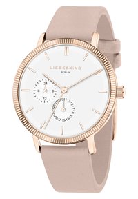Montre en or rose avec un cadran blanc, dotée de deux sous-cadrans ; bracelet lisse beige. Lunette texturée, marqueurs d'heure minimalistes.