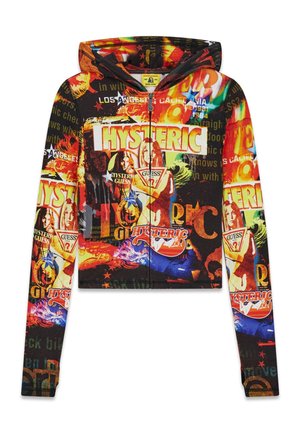 Sweat à capuche zippé coloré avec un collage de visages, grand texte "HYSTERIC", étoiles et logos "GUESS" en rouge, jaune, bleu et noir.
