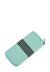Rectangular mint green wallet with a zipper, featuring a black, pink, and green zigzag fabric band across the center.