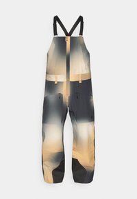 Παντελόνια εξωτερικών δραστηριοτήτων τύπου bib, με μαύρες ρυθμιζόμενες τιράντες, σε gradient χρώμα μπεζ-γκρι, μπροστινό φερμουάρ και τσέπες στο μπούστο με φερμουάρ.