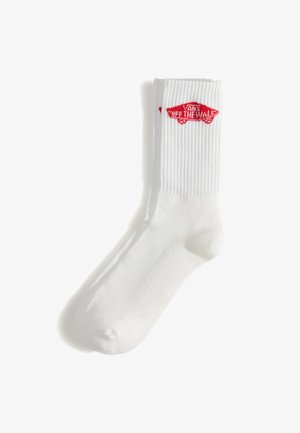 Calcetines blancos de algodón con textura acanalada. Presentan un logo rojo "OFF THE WALL" en forma de coche en la parte superior.