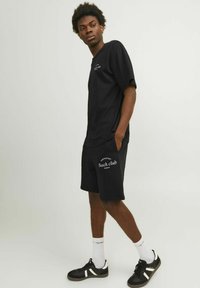 Jack & Jones PREMIUM Spodnji deli trenirk - schwarz