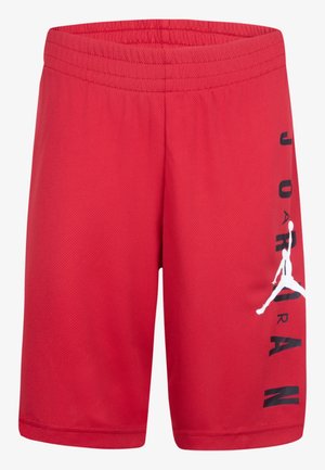 Czerwone sportowe spodenki z elastycznym pasem, teksturowaną tkaniną oraz czarnym pionowym napisem "JORDAN" obok białej sylwetki koszykarza.
