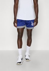 Blue mesh athletic shorts with gray accents, featuring a white "LA" logo. Paired with white socks and black and white athletic shoes.