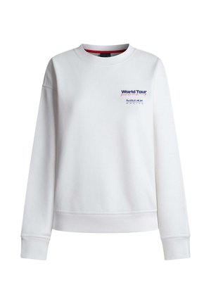 Bela majica s posadko in okroglim izrezom z napisom "World Tour Red Bull Racing" in logotipom na levi prsi, z dolgimi rokavi ter rebrastimi manšetami in spodnjim robom.