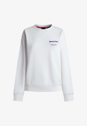 Bela majica s posadko in okroglim izrezom z napisom "World Tour Red Bull Racing" in logotipom na levi prsi, z dolgimi rokavi ter rebrastimi manšetami in spodnjim robom.