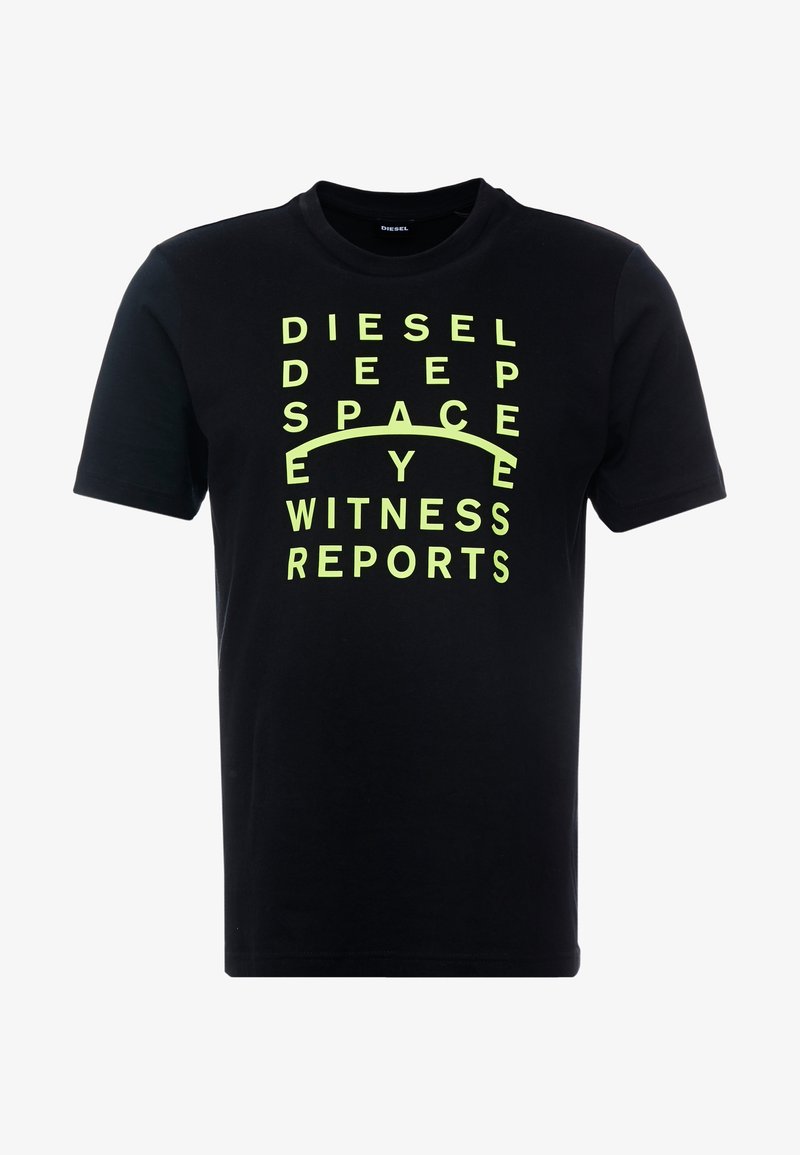 T-shirt en coton noir avec un texte en néon vert audacieux : "RAPPORTS DE TÉMOIN DE L'ŒIL DE L'ESPACE PROFOND DIESEL." Design classique à manches courtes et col rond.