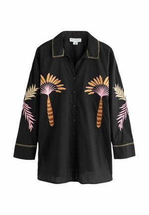 Black long-sleeve button-up shirt with collar, featuring embroidered palm tree designs in pink, brown, and yellow on front and sleeves.