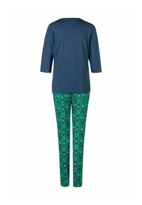 Dark blue top with a scoop neck and three-quarter sleeves paired with green patterned trousers featuring geometric designs in shades of blue and brown.