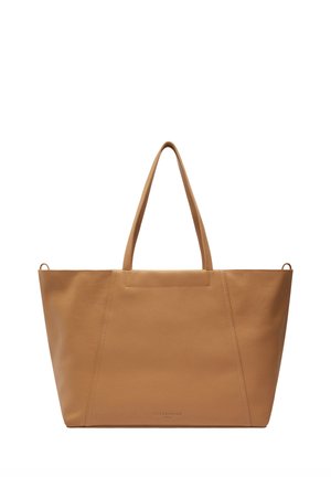 Beiges Leder-Shopper mit zwei Schulterriemen und minimalen Nähten, rechteckig mit leicht zulaufenden Seiten.