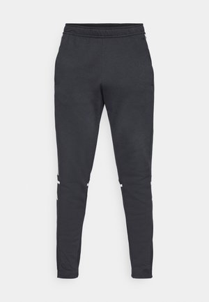 Pantaloni sportivi neri a gamba affusolata con cintura elastica, texture liscia, accenti riflettenti sui lati e polsini alla caviglia. Adatti per l'abbigliamento sportivo.