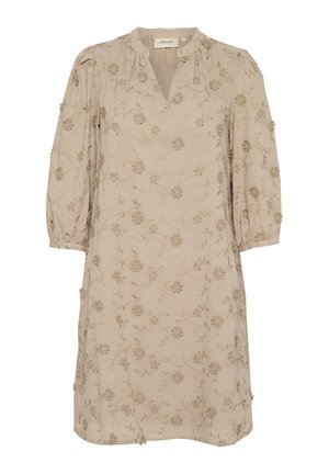 Beige dress with a V-neck, three-quarter sleeves, and floral embroidery. Soft fabric with textured, raised patterns throughout.
