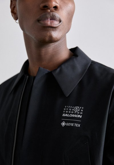MM6 Maison Margiela SALOMON - Casaco impermeável - black