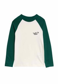 Langarm-T-Shirt mit grünen Raglan-Ärmeln und cremefarbenem Körper. Bedruckt mit "TAKE IT EASY" auf der linken Brust in Schwarz. Aus weichem Baumwollstoff.