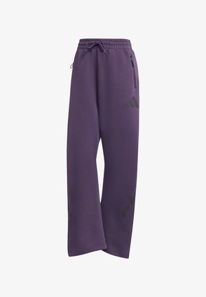 Purple sweatpants made of soft material with an elastic waistband, drawstring, and black accent stripes and logo on the sides.