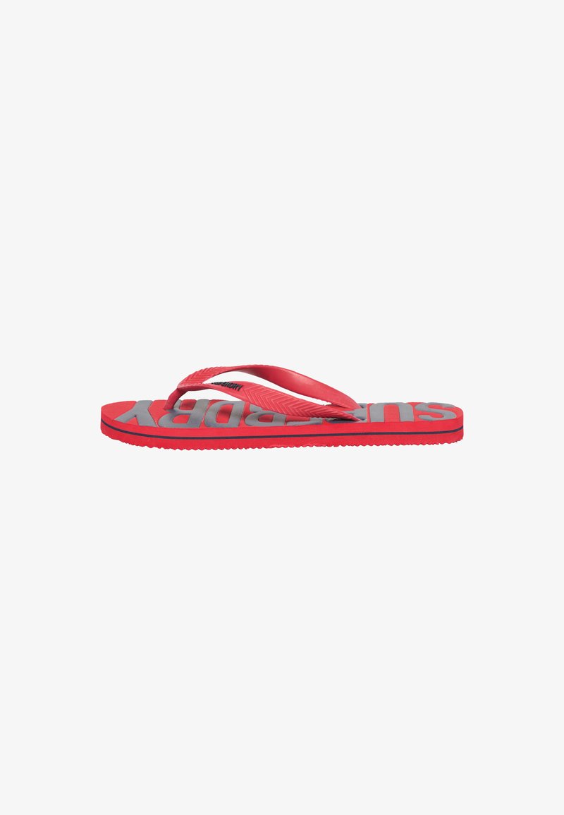 Red flip-flop with a contoured footbed, featuring a textured strap and grey logo detail. Rubber material with a flat sole for comfort.