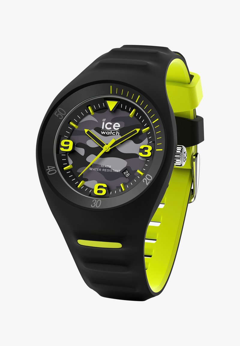 Czarny zegarek silikonowy z twarzą w camo, żółtymi akcentami i okrągłą tarczą. Posiada duże, wyraźne cyfry oraz odporność na wodę do 10 ATM.