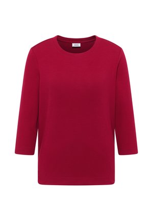 Czerwony t-shirt z rękawem 3/4, wykonany z miękkiego materiału, z okrągłym dekoltem i prążkowaną teksturą. Bez widocznych wzorów ani akcentów.