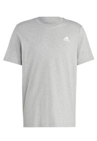 Camiseta de algodón gris con mangas cortas, cuello redondo y un pequeño logo blanco en el lado izquierdo del pecho. Textura suave, ajuste estándar.
