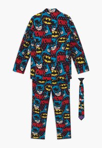 Batman-thema pyjama set met lange mouwen top en broek. Kleurrijke print met Batman gezichten en "POW!" tekst op een donkere achtergrond. Inclusief stropdas.