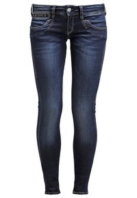 Jean skinny bleu foncé avec des détails délavés, cinq poches, passants de ceinture et fermeture avant par bouton et zip.
