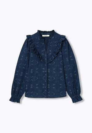 Blouse à manches longues bleu marine avec un motif géométrique subtil, un col en V froncé et des poignets élastiques froncés.