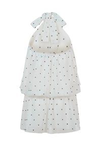 Robe blanche sans manches à col halter avec des pois noirs et une coupe ample à étages.