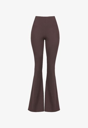 Brązowe spódnice w wysokim talia, rozszerzające się na dole, wykonane z teksturowanej tkaniny, charakteryzujące się gładkim wykończeniem i dopasowanym krojem w okolicy bioder.