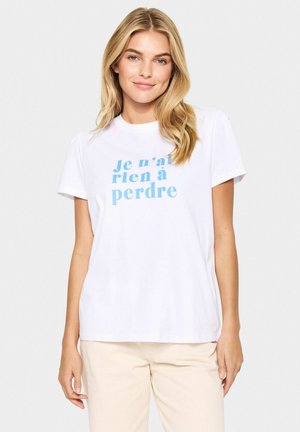 White cotton t-shirt featuring blue text that reads "Je n'ai rien à perdre." Short sleeves and a crew neckline with a relaxed fit.