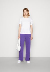 Nike Sportswear SPORTSWEAR PHOENIX FLEECE - Calças de fato de treino - lapis