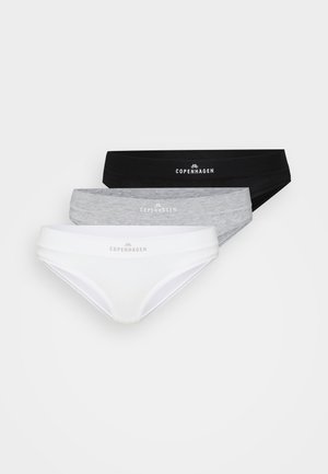 Weißer, taillierter Bralette mit V-Ausschnitt; kombiniert mit schwarzem Bikiniunterwäsche mit Logo am Bund. Glatter Stoff.