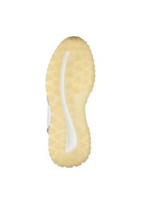 Sohlenansicht eines Schuhs mit einer strukturierten, cremefarbenen Gummimischung, die dreieckige Traktionsmuster und eine zentrale Nut für Flexibilität aufweist.