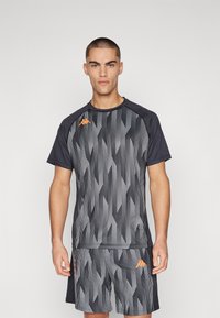 Sporty black and gray short-sleeve shirt and shorts set with vertical striped pattern; features orange logo and accents on shorts.