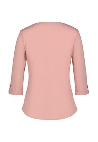 Helles rosa Oberteil mit drei Viertel Ärmeln, rundem Halsausschnitt und hochgerollten Bündchen. Glattes Material mit einer einfachen, schlanken Silhouette.