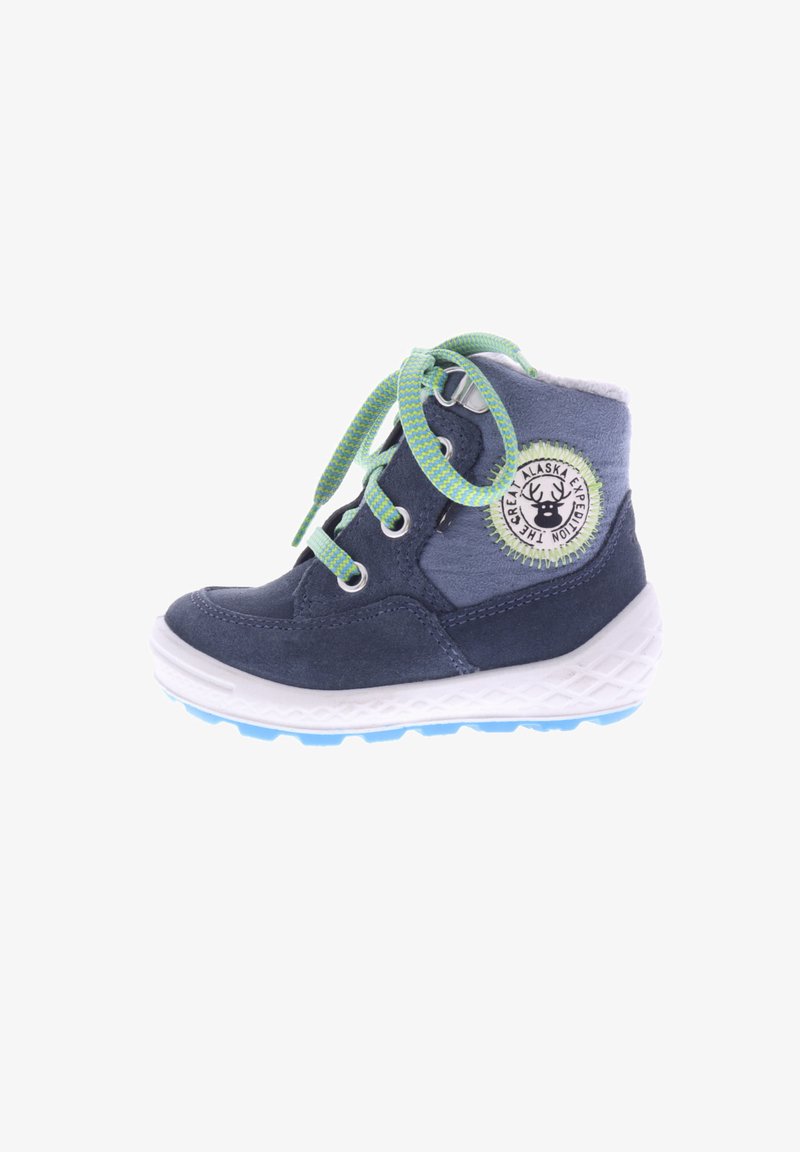 Navy blue suede ankle boot with gray accents, green patterned laces, and a circular logo patch. White midsole with blue rubber outsole.
