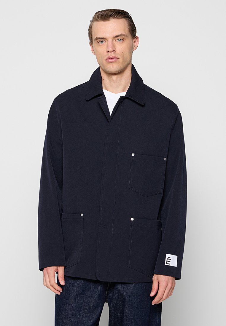 Études Lichte jas donkerblauw