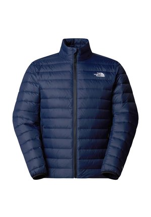 Giacca a vento blu navy con colletto alto, design trapuntato, zip frontale completa e dettaglio del logo sul petto. Presenta polsini elasticizzati e tasche laterali.