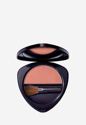 Kompakte schwarze Make-up-Tasche mit Pfirsichrouge und einem kleinen Pinsel mit braunen Borsten im Inneren, Deckel geöffnet und zeigt Produkt und Pinsel.