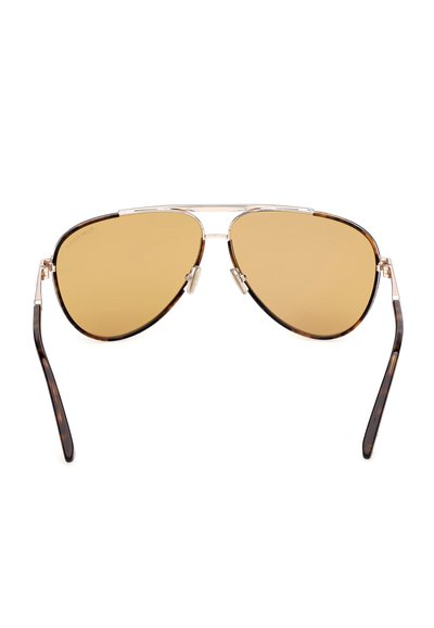 Aviatorzonnebril met bruin getinte glazen, een dunnen gouden metalen montuur, pootjes met schildpadmotief en verstelbare neuspads.