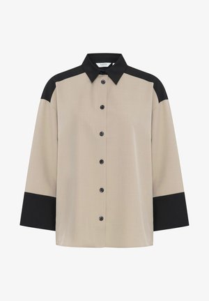 Beige und schwarzes Hemd mit Knopfleiste und Kragen, mit kontrastierenden Ärmeln und geradem Saum, aus glattem Stoff gefertigt. Schwarze Knöpfe auf der Vorderseite.