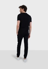 pantalon coq sportif femme bordeaux