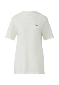 T-shirt en coton blanc à manches courtes, col rond, et une petite phrase imprimée en noir sur le côté gauche supérieur. Design simple et décontracté.