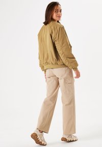 Garcia Bomberjacks - golden sun