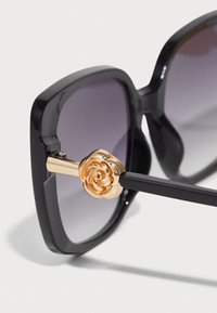 ALDO CARO - Gafas de sol - black/gold multi