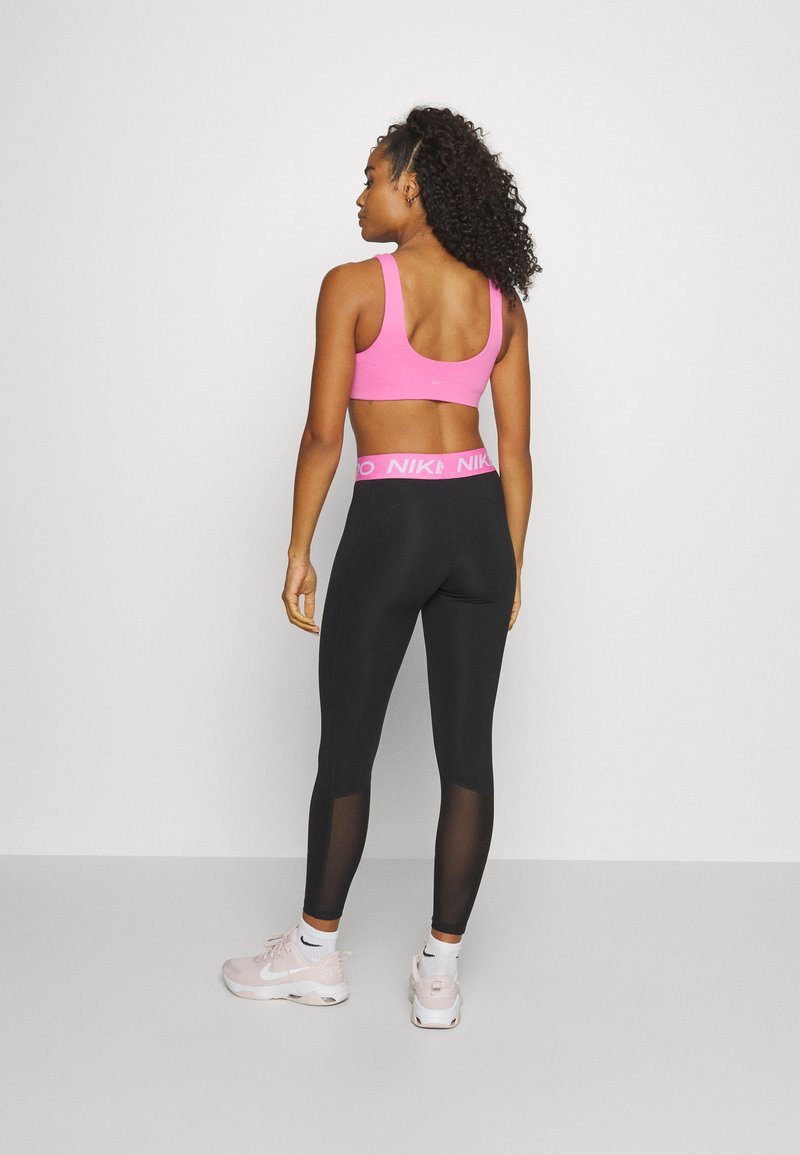 black and pink nike leggings