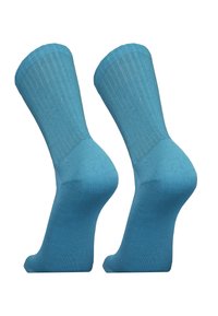 Light blue, ribbed crew socks with a smooth texture, featuring a reinforced heel and toe. Designed for comfort and fit.