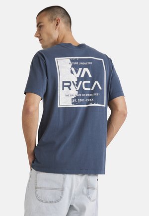 Navy blue short-sleeve T-shirt featuring a white graphic print on the back, with text and a rectangular border. Cotton material with a relaxed fit.