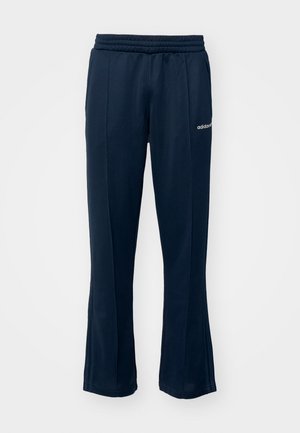 Námornícke tepláky s elastickým pásom, rovnými nohavicami a jemnými bočnými švami. Obsahujú malé biele logo na ľavom boku.