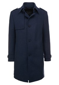 Cappotto in lana blu navy con taglio dritto, due tasche frontali, chiusura a bottoni, spalline sulle spalle e fettucce sui polsini. Texture liscia.